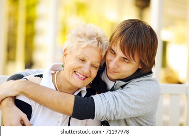 Mother And Son Having A Hug