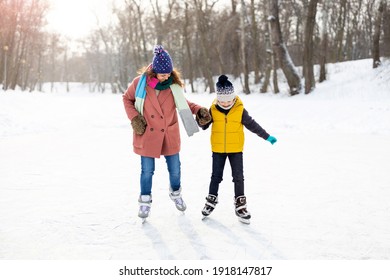 Mother And Son Ice Skating
