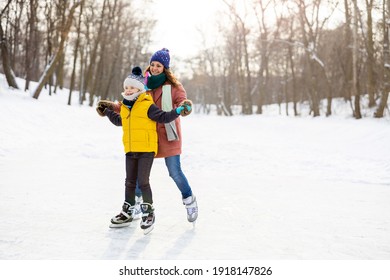Mother And Son Ice Skating

