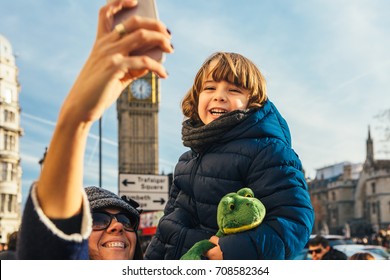 Mother And Son Making Selfie Near Big Ben