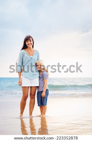 Mother and Son on the Beach by the Sea