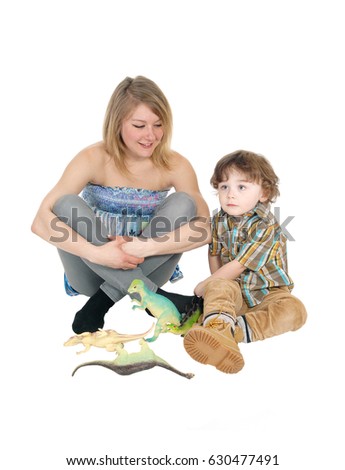 A mother and son sitting on the floor playing with his toy dinosaurs,
isolated for white background.
