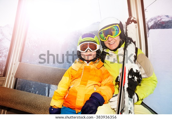 mother-son-ski-lift-happy-600w-383936356