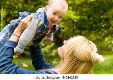Mother and son spending time in nature - Shutterstock ID 440162920