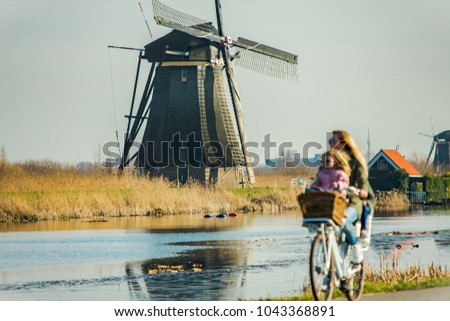 Mother and sons biking in the Netherlands