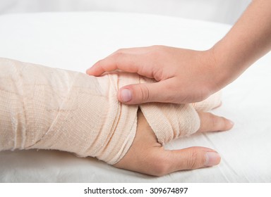 mother splint hand with holding son hand together isolate on white background - Powered by Shutterstock