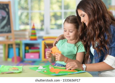 Mother Teaches Kid To Do Craft Items