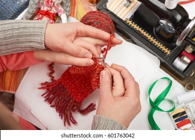 mother teaching daughter girl knit, top view, sewing accessories top view, seamstress workplace, many object for needlework, handmade and handicraft - Powered by Shutterstock