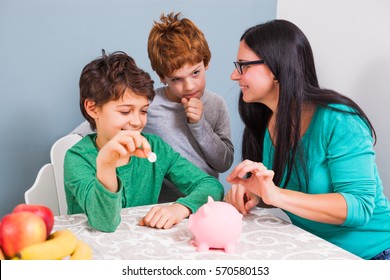 Mother Is Teaching Her Sons How To Save Money. 