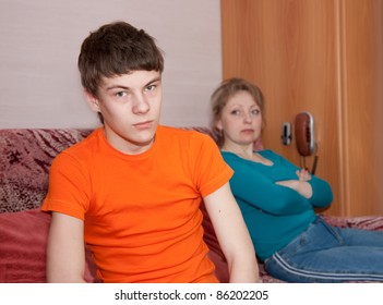 Mother And Teen  Son Having Quarrel At Home