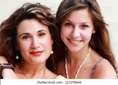 Mother And Teenage Daughter Outside