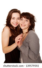 Mother And Teenage Daughter Together. Happy Family. Isolated On White Background