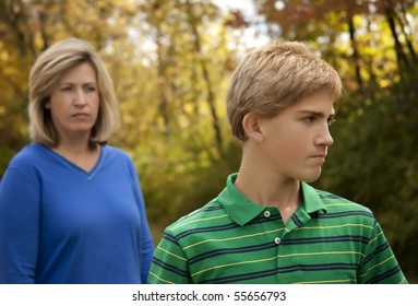 Mother And Teenage Son At Odds