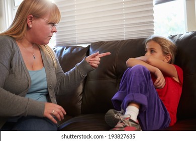 Mother Telling Off Daughter At Home