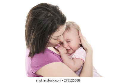 A Mother trying to calm her crying baby isolated on white background