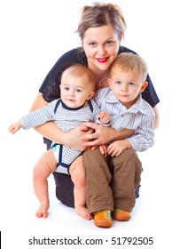 Mother And Two Boys. Isolated On White Background