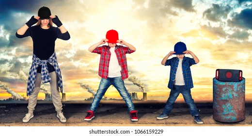 Mother and two son dance hip-hop.Urban lifestyle. Hip-hop generation.