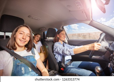 Mother and two teenage daughters during road trip - Powered by Shutterstock