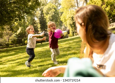 Mother Watching Over Her Children Playing Stock Photo 1343719214 