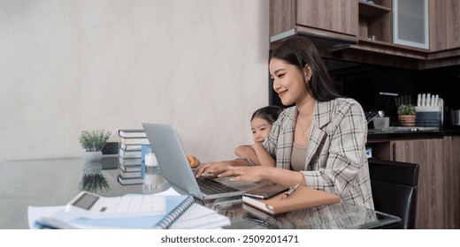 Mother Working from Home with Daughter. Balancing Remote Work and Parenting - Powered by Shutterstock