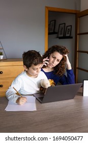 Mother Working From Home With A Kid. Quarantine Mode