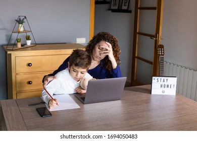 Mother Working From Home With A Kid. Quarantine Mode