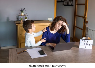 Mother Working From Home With A Kid. Quarantine Mode