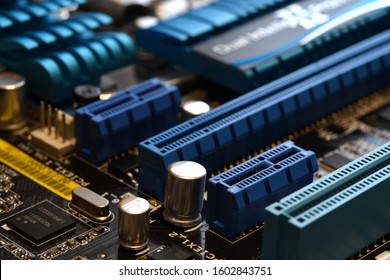 Motherboard with blue PCI-express slot, close-up and selective focusing