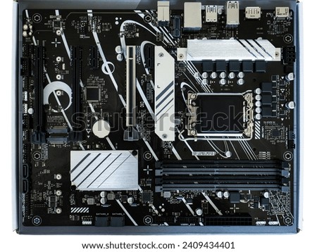 Motherboard with components. electronic computing board, laptop repair, top view, close-up
