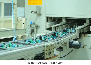 motherboard making process. circuit board. electronic hardware close up. electric systems computer mother board chip hardware. production process of electronic hardware. circuit board manufacturing