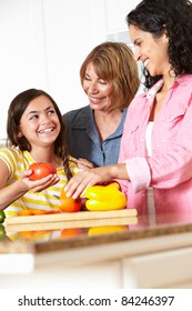 Mother,daughter And Grandmother Cooking