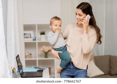 motherhood, multi-tasking, family and people concept - happy mother with baby calling on smartphone at home - Powered by Shutterstock