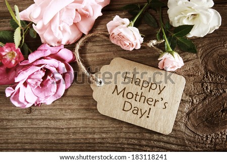 Mothers day card with rustic roses on wooden board