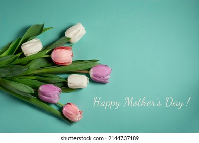 Mothers day card. Tulips white pink purple flowers on turquoise background - Shutterstock ID 2144737189
