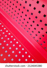 Motif In Red Metal Chair In Train Station