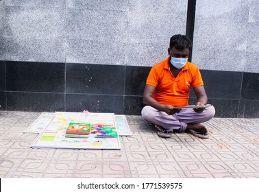 Motijheel,Dhaka Bangladesh 08/07/2020. Unknown Seller Sell Book And Some Leaflet 