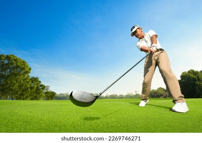 Motion action of golfer teeing off with drivers. - Powered by Shutterstock