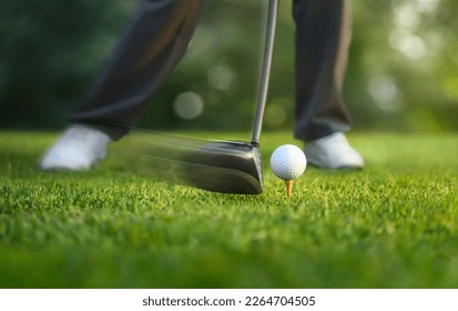 Motion action of teeing off golf ball with drivers. - Powered by Shutterstock