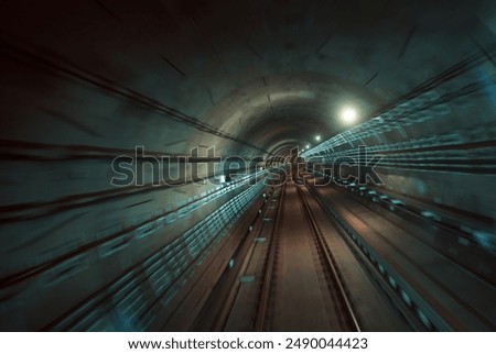 Motion blur and abstract background effect from inside mass rapid train (MRT) tunne in Singapore. sSelective focus.