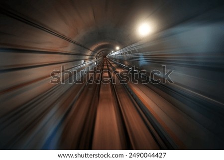 Motion blur and abstract background effect from inside mass rapid train (MRT) tunne in Singapore. sSelective focus.