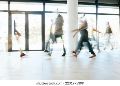 Motion blur, busy office and business people walking, moving or fast speed in workplace, startup company or agency. Group of workers, crowd and employees rush movement in lobby, building and hallway - Powered by Shutterstock