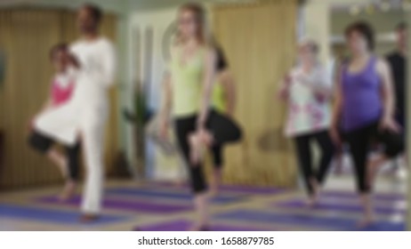 Motion Blur Of Instructure Leading Stretching Before Entering Core Exercise At The Gym