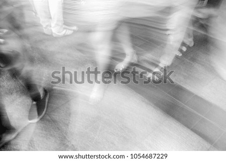 Similar – Image, Stock Photo Squatting female person from behind. The back is free, the waist is covered by a kidney warmer