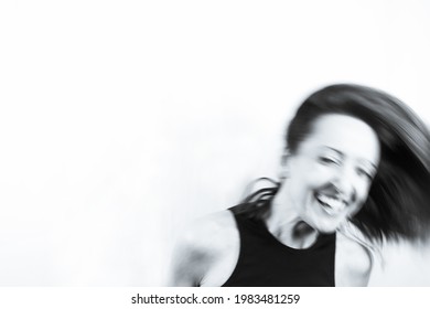 Motion Blur Portrait Of Woman Over 40. Black Tshirt