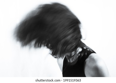 Motion Blur Portrait Of Woman Over 40. Black Tshirt