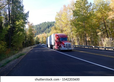 Motion blur of Semi truck and trailer climbing towards Blewett Pass in eastern Washington