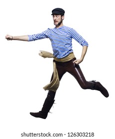 Motion Blur Shot Of A Man In Leather Pants And Waist Sash Jumping