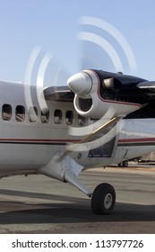 Motion Blur Of Spinning Propeller Blades On Turbo Prop Aircraft Engine.