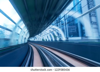 Motion blur of train moving inside tunnel 