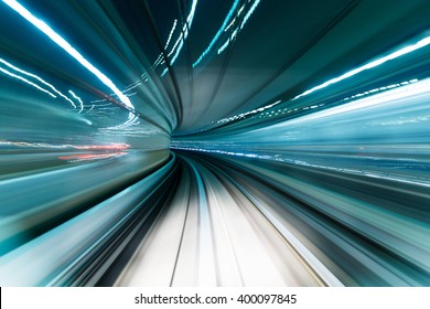 Motion blur of train moving inside tunnel 